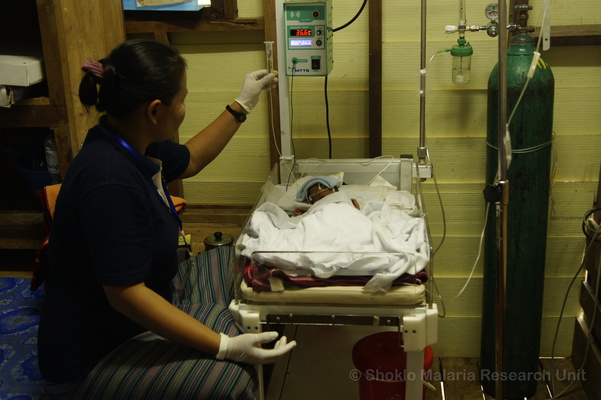 Medic tending to a premature baby in the SCBU